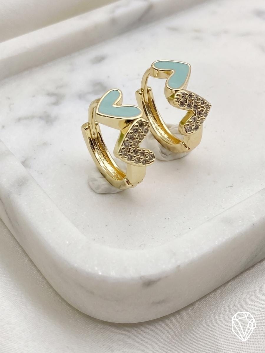 Aretes Corazón Celeste — Oro Laminado Americano | Varelis